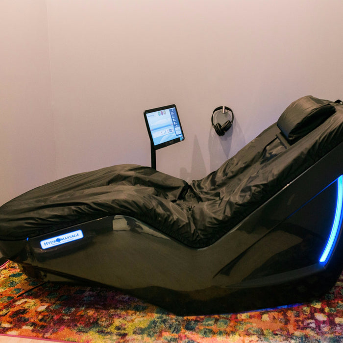 A hydromassage lounge chair displayed in the Radiance Float + Wellness facility.
