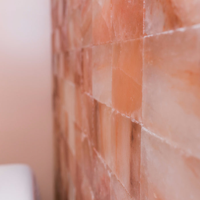 A wall of salt tiles located in the salt room at Radiance Float + Wellness